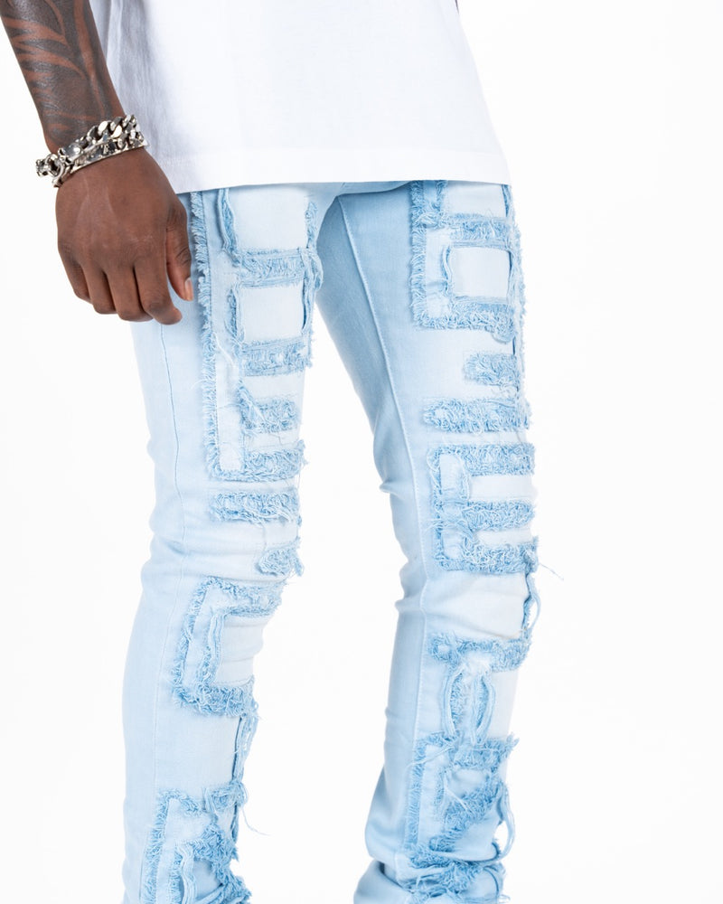 "INSPIRED BY" FLARE STACK DENIM