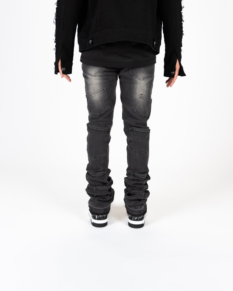 'EMOTIONALLY NUMB" FLARE STACK DENIM