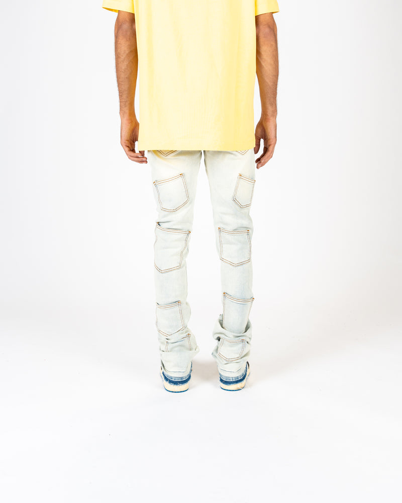 'EMOTIONALLY NUMB" FLARE STACK DENIM