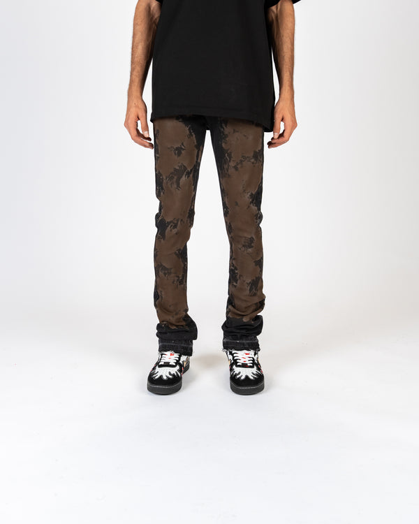 "SCARRED BY" FLARE STACK DENIM